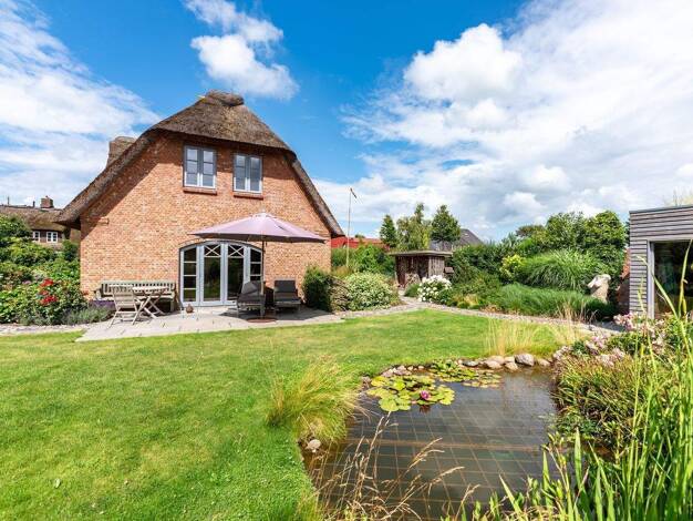 Einfamilienhaus zum Kauf 1.360.000 € 5 Zimmer 170 m² 901 m² Grundstück Midlum 25938