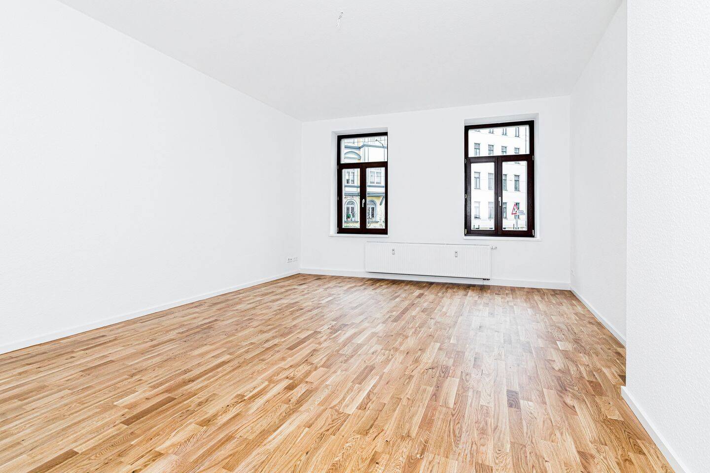 Großzügige 3-Zimmer-Wohnung im Erdgeschoss mit Süd-Balkon – Wolfener Straße 2, 4155 Leipzig – Bild 1 von 14