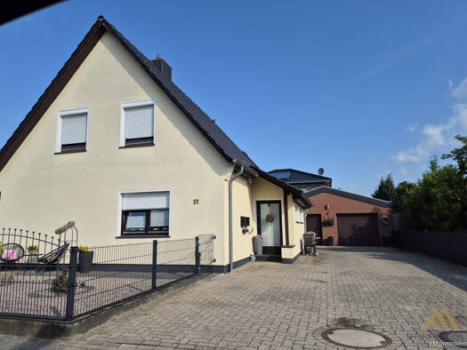 Einfamilienhaus zum Kauf 310.000 € 180 m² 517 m² Grundstück Dinklage 49413