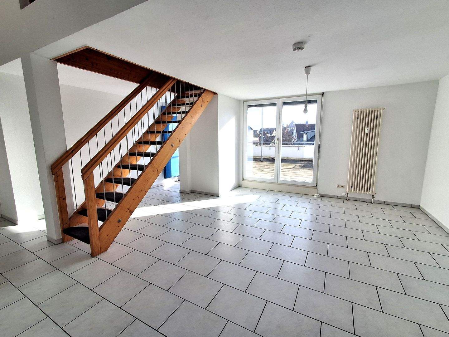 Immobilie in Gottmadingen - Zentral gelegene 4-Zimmer Maisonettewohnung mit großer Dachterrasse und Tiefgaragenstellplatz - Bild 1