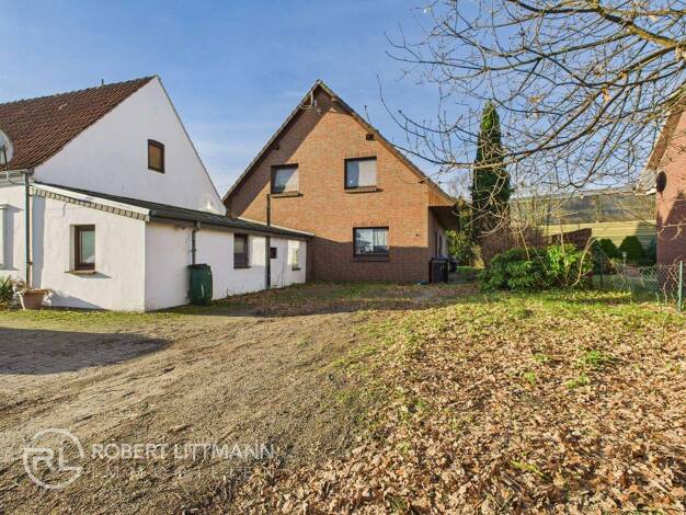 Einfamilienhaus zum Kauf 427.000 € 7 Zimmer 178 m² 718,9 m² Grundstück Ritterhude 27721