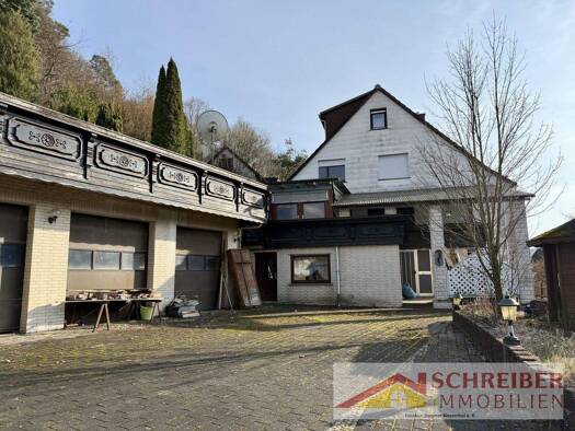 Doppelhaushälfte zum Kauf 180.000 € 8 Zimmer 130 m² 1.802 m² Grundstück Wolzhausen Breidenbach 35236