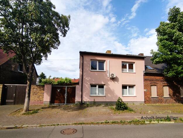 Doppelhaushälfte zum Kauf 118.000 € 4 Zimmer 120 m² 223 m² Grundstück frei ab sofort Wolfener Straße 30 Greppin Bitterfeld-Wolfen 06803