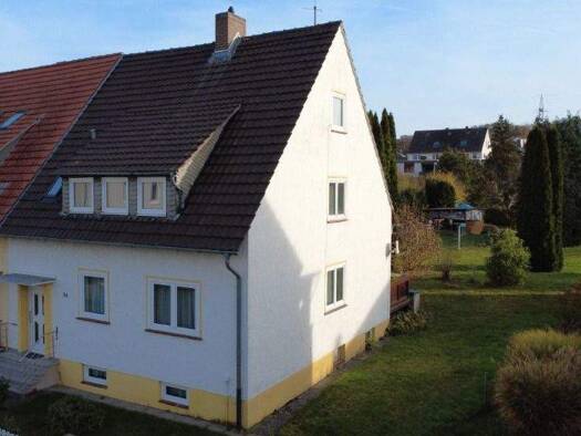 Mehrfamilienhaus zum Kauf 250.000 € 6 Zimmer 122 m² 1.400 m² Grundstück Sandershausen Niestetal 34266