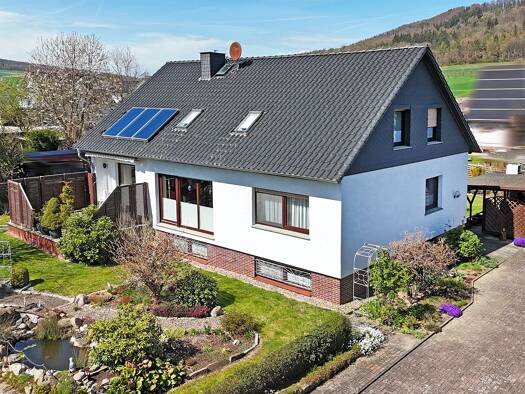 Einfamilienhaus zum Kauf 300.000 € 9 Zimmer 192 m² 1.040 m² Grundstück Amelgatzen Emmerthal 31860
